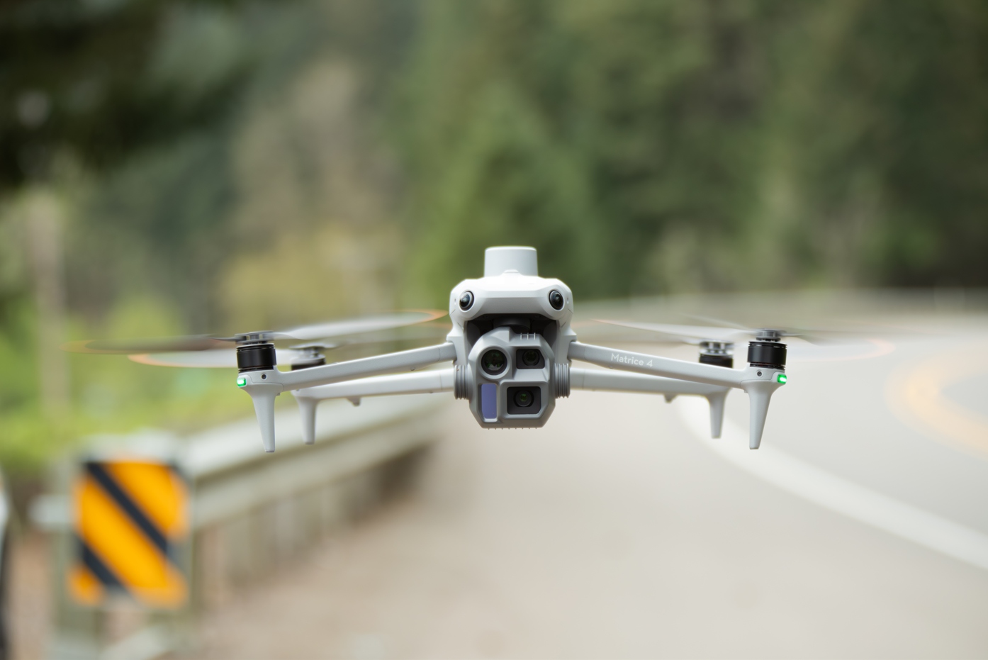 Valley Sceneworks DJI Matrice 4E survey drone in flight over a rural Oregon road